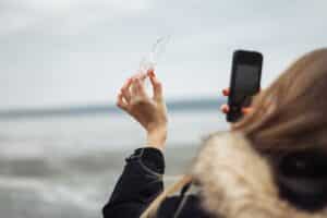 5 Crucial Mistakes to Avoid After a Winter Injury: From a Staten Island Ice Slip and Fall Attorney young woman taking pictures with a mobile phone 2024 11 29 19 20 33 utc 01